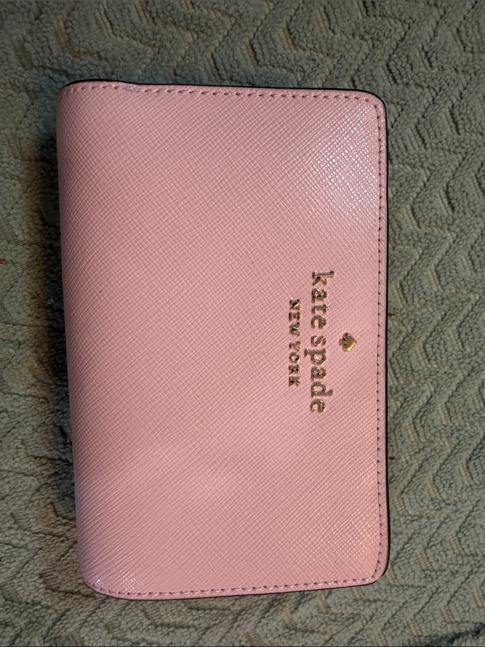 Kate Spade pale pink compact wallet with gold 
Excellent pre owned condition